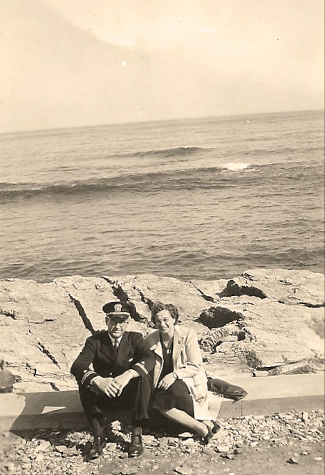 old photo of couple at the shore